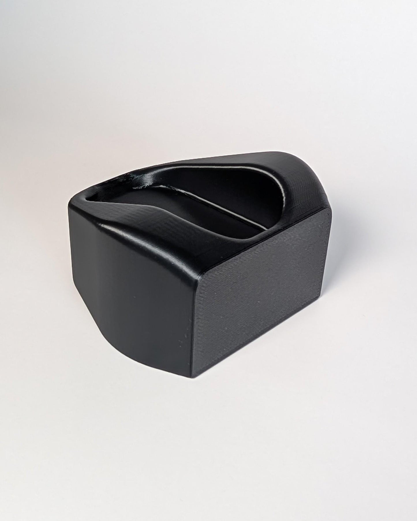 Black rectangular object on a white background