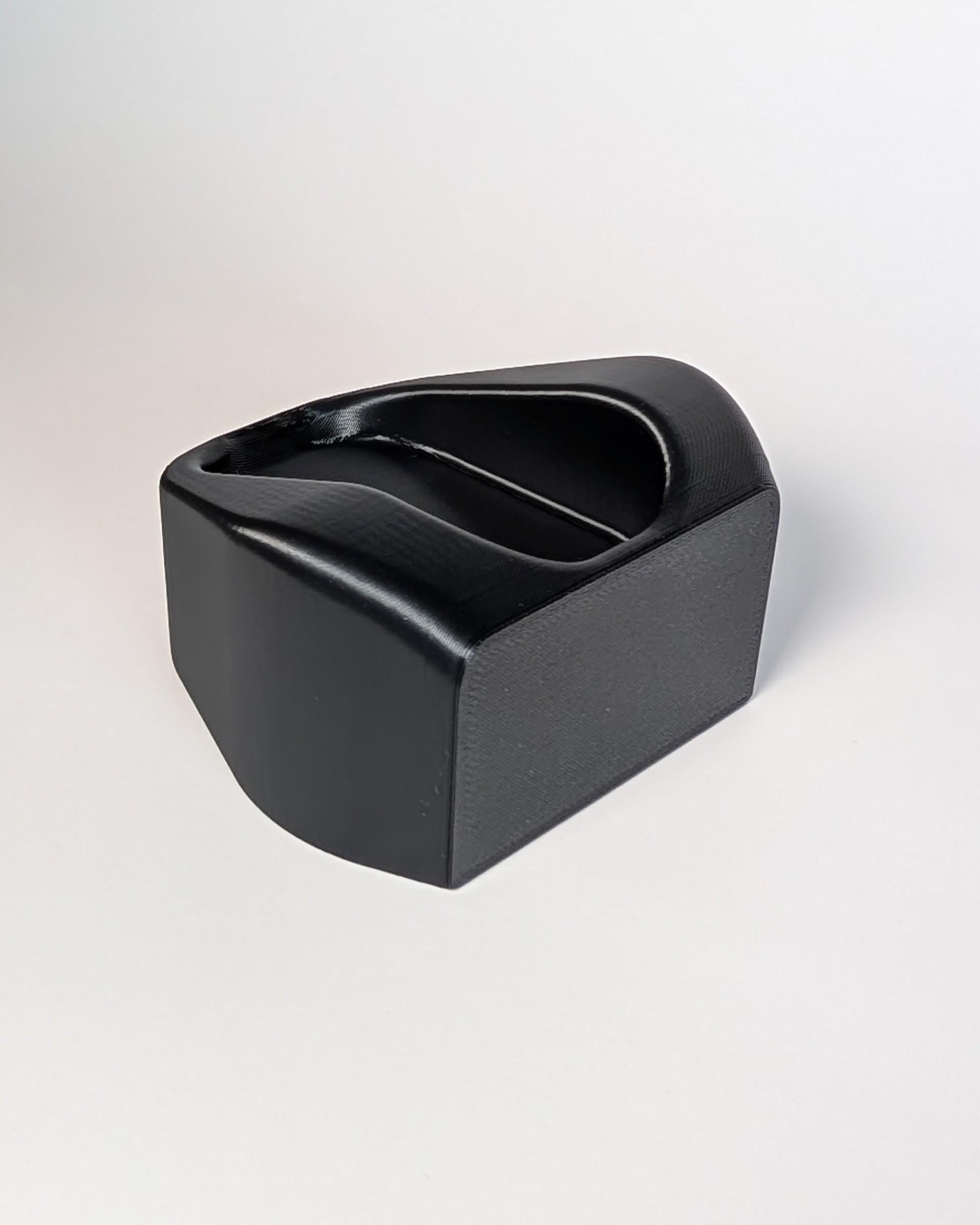 Black rectangular object on a white background